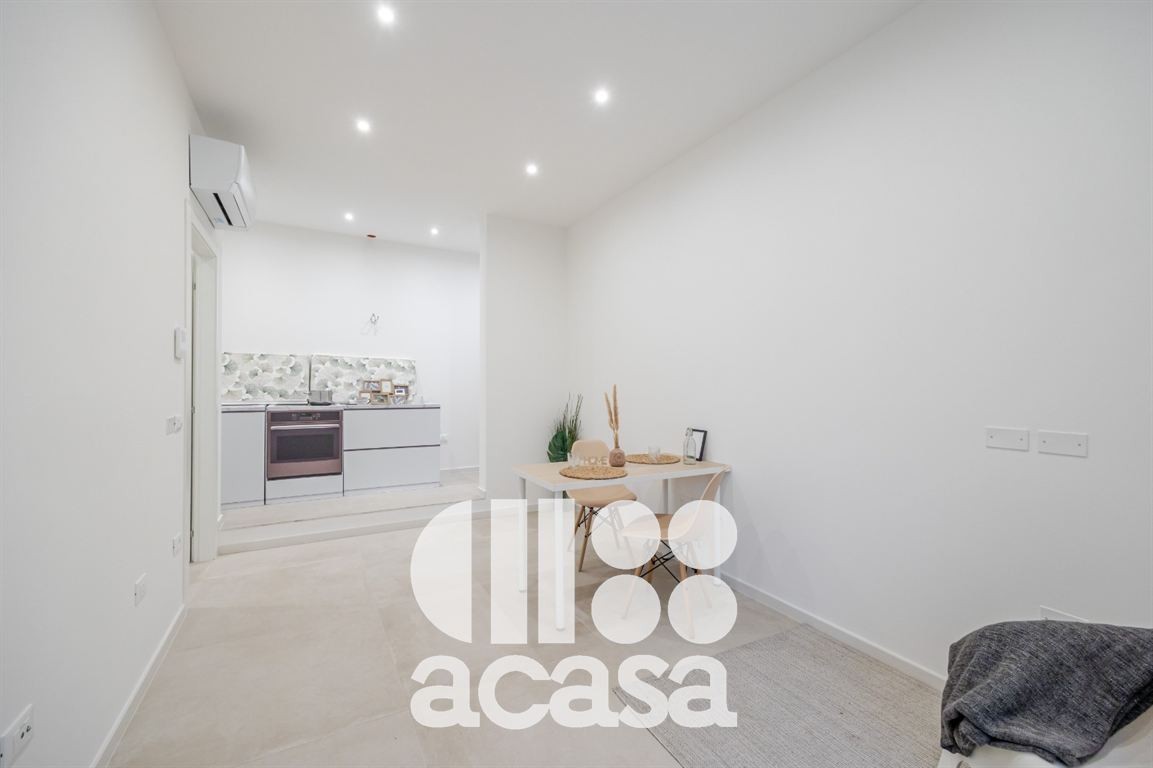 APPARTAMENTO NUOVO CON GIARDINO E GARAGE