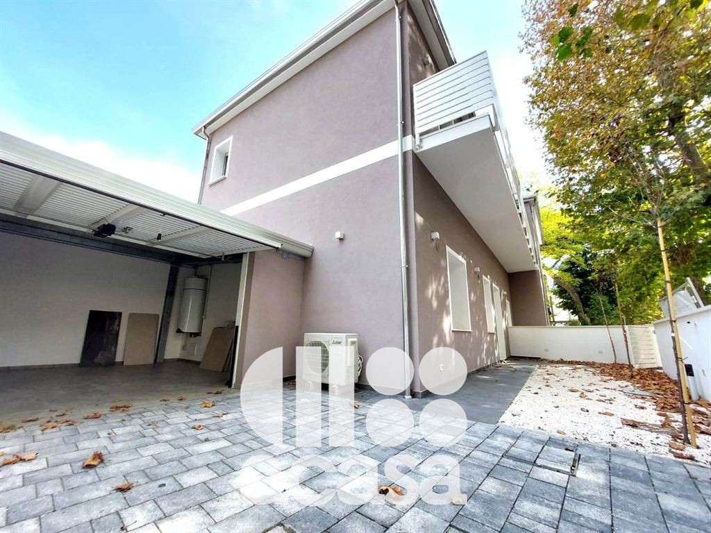 APPARTAMENTO NUOVO CON GIARDINO E GARAGE