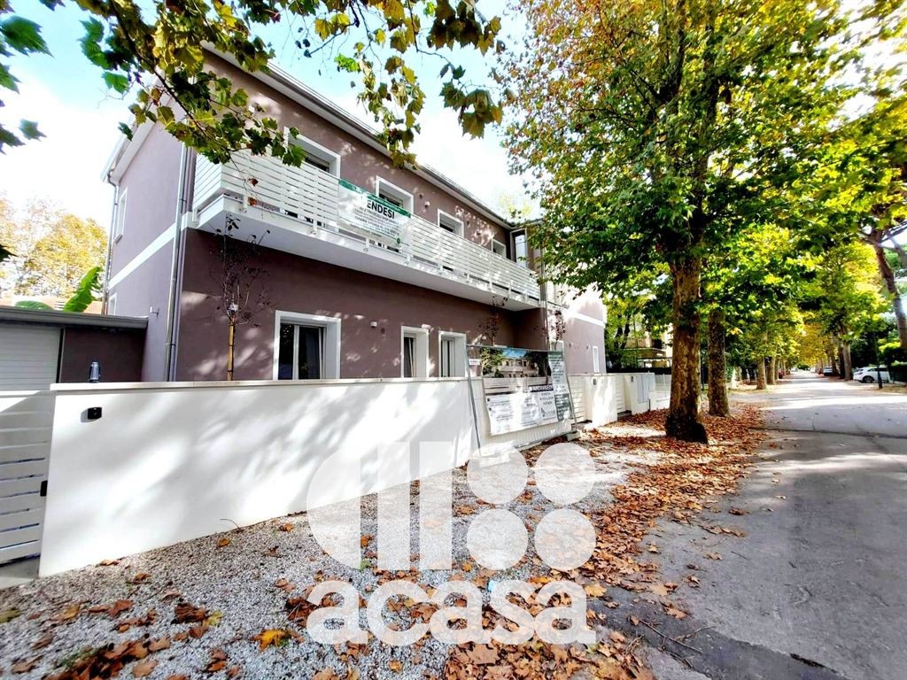 APPARTAMENTO NUOVO CON GIARDINO E GARAGE