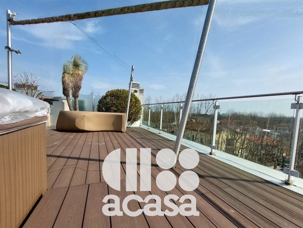 ATTICO CON AMPI TERRAZZI